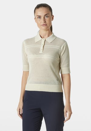 Knit polo shirt in light cream with short sleeves, featuring a ribbed collar and textured mesh pattern across the body.