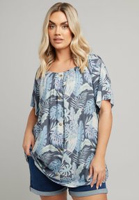 Floral blouse featuring a dark blue background, short sleeves, elastic neckline, and light blue and green leaf patterns with gold buttons.