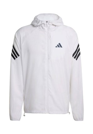 Giacca leggera bianca con cappuccio, caratterizzata da accenti neri a tre strisce sulle maniche e un piccolo logo grigio. Chiusura a zip completa e orlo regolabile.