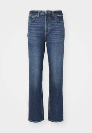 Sinise denimid, laia sääre lõikega, omavad klassikalist viie-tasku disaini, metallist riistvara ja kerget kulumist esiosas.