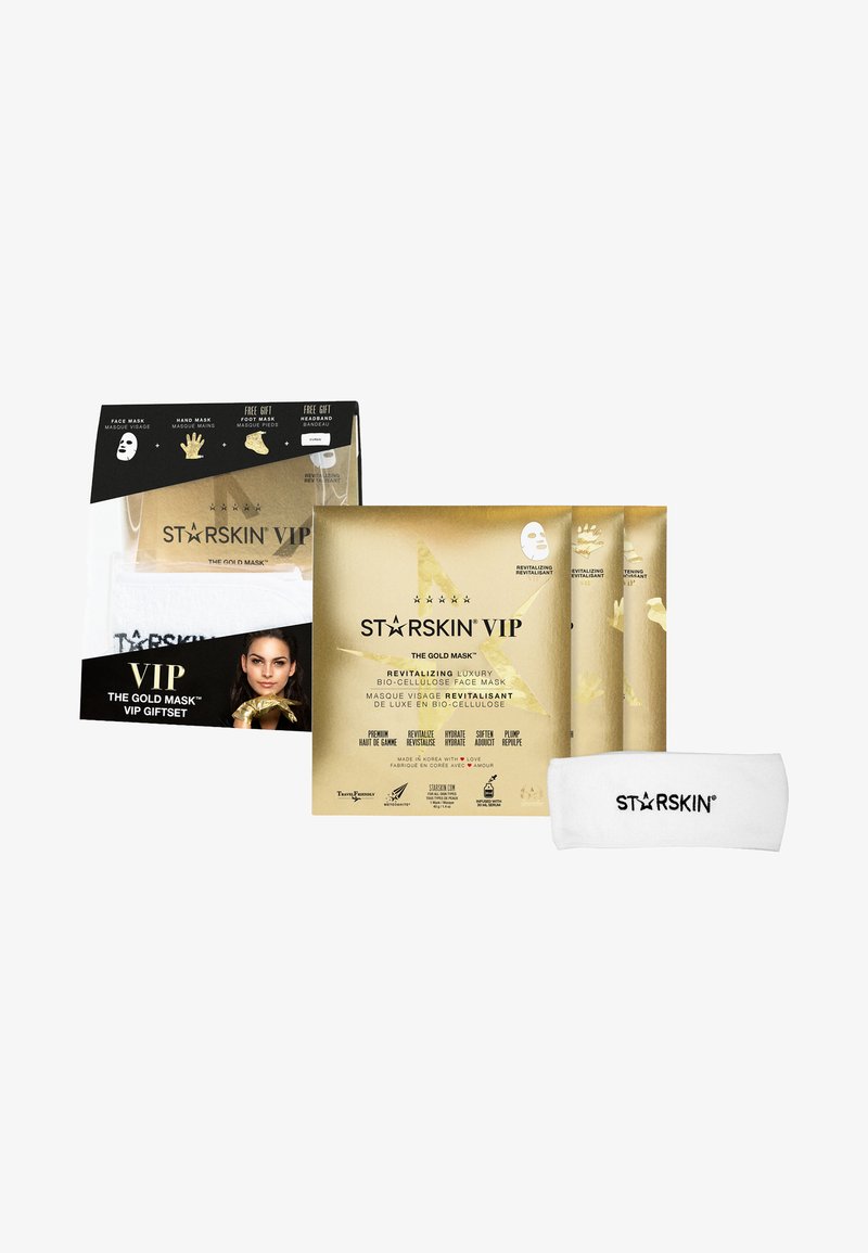 STARSkin VIP gavegave med tre gull bio-cellulose ansiktsmasker, sammen med et hvitt merkebånd i en elegant svart og gullboks.