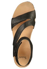 Sandale en cuir noir avec deux lanières croisées, bout rond, semelle intérieure en cuir naturel et intérieur avec branding. Surface texturée sur les lanières.