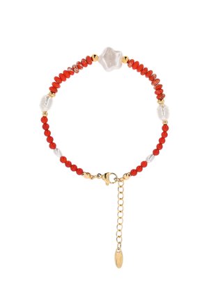 Rannekoru, jossa vuorottelevat punaiset ja valkoiset helmet, kultaiset tilanneroset, kultainen mustekalalukko sekä säädettävä ketju, jossa ovaalinen koriste.