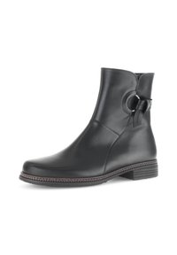 Schwarze Leder-Stiefelette mit glatter Oberfläche, runder Spitze, niedrigem Blockabsatz und dekorativem kreisförmigem Detail an der Seite. Gummiluftsohle.