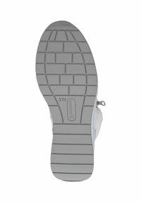 Semelle de chaussure en caoutchouc gris avec un motif texturé de blocs rectangulaires. Présente une fermeture éclair sur le côté et une marque "Caprice". Taille 37H.