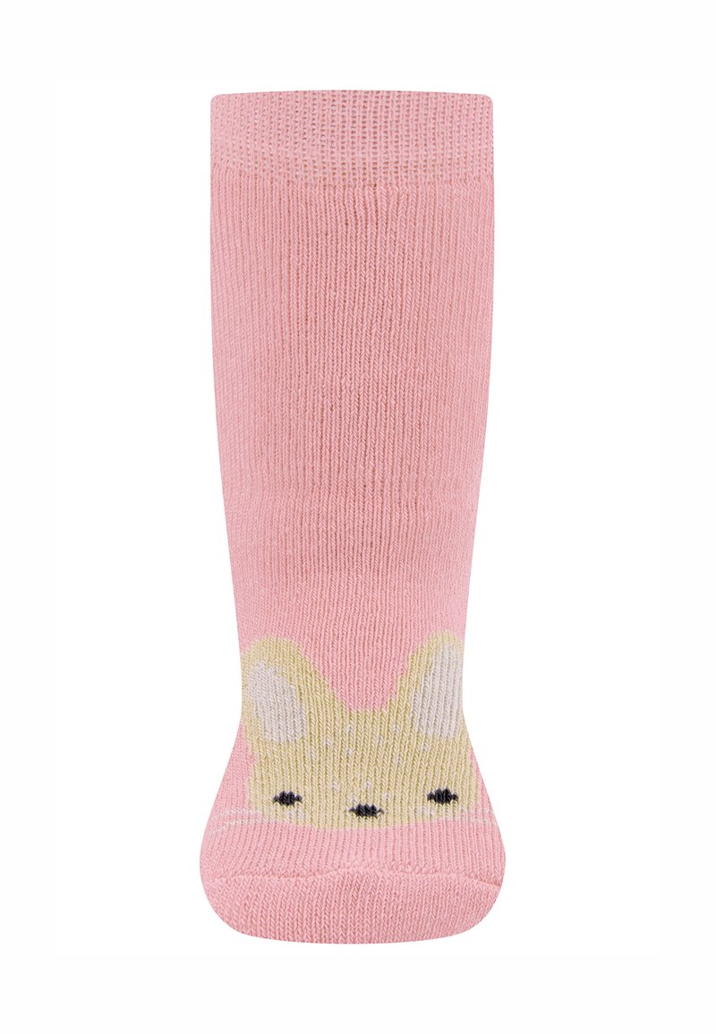 Rosa gestrickte Socken mit einem Hasendesign an der Spitze, gelben Akzenten und schwarzen Gesichtszügen. Weiche Textur, mittellange Wadenlänge.
