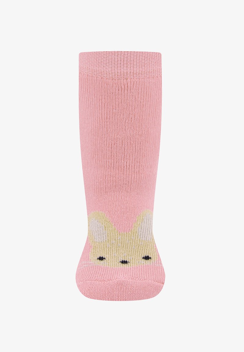 Rosa gestrickte Socken mit einem Hasendesign an der Spitze, gelben Akzenten und schwarzen Gesichtszügen. Weiche Textur, mittellange Wadenlänge.