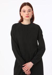 Modanisa BENIN - Pantalones deportivos - black