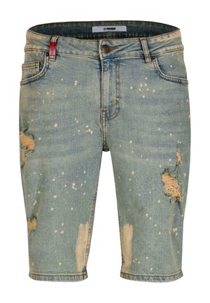 Jeansshorts i en falmet blå farve med slidte områder og hvide sprøjtede mønstre. Standard forlommer og lynlåsdesign.