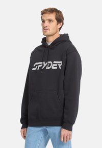 Felpa nera in misto cotone con tasca a marsupio frontale e logo "SPYDER" bianco, dotata di cappuccio regolabile con coulisse e polsini a coste.