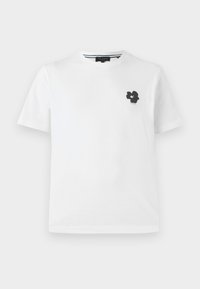 White cotton t-shirt with a v-neck, featuring a small black floral graphic on the left chest area. Short sleeves with a relaxed fit.