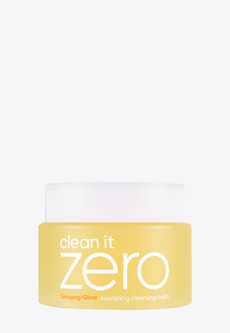 Gul krukke med rensebalm med hvitt skrulokk. Etiketten har teksten «clean it zero Ginseng-Glow» i fet hvit skrift. Glatt overflate.