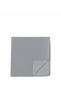 Gray tablecloth featuring a textured pattern, with a folded corner revealing a striped accent. Material appears light and woven.