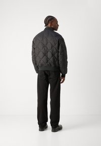 Tommy Hilfiger ONION QUILTED - Bomber-jakk - black