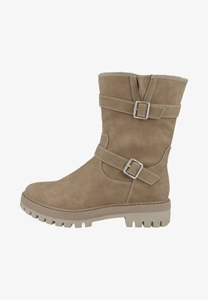 Tan suede ankle boots with two adjustable straps and metal buckles. Thick, textured rubber soles with a contoured edge. Reinforced seam details.