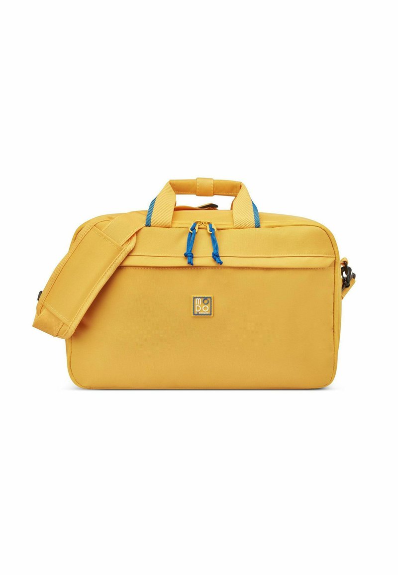 Borsa di tessuto gialla con doppie maniglie superiori, tracolla staccabile, dettagli blu, due cerniere e una piccola etichetta con logo sul davanti.