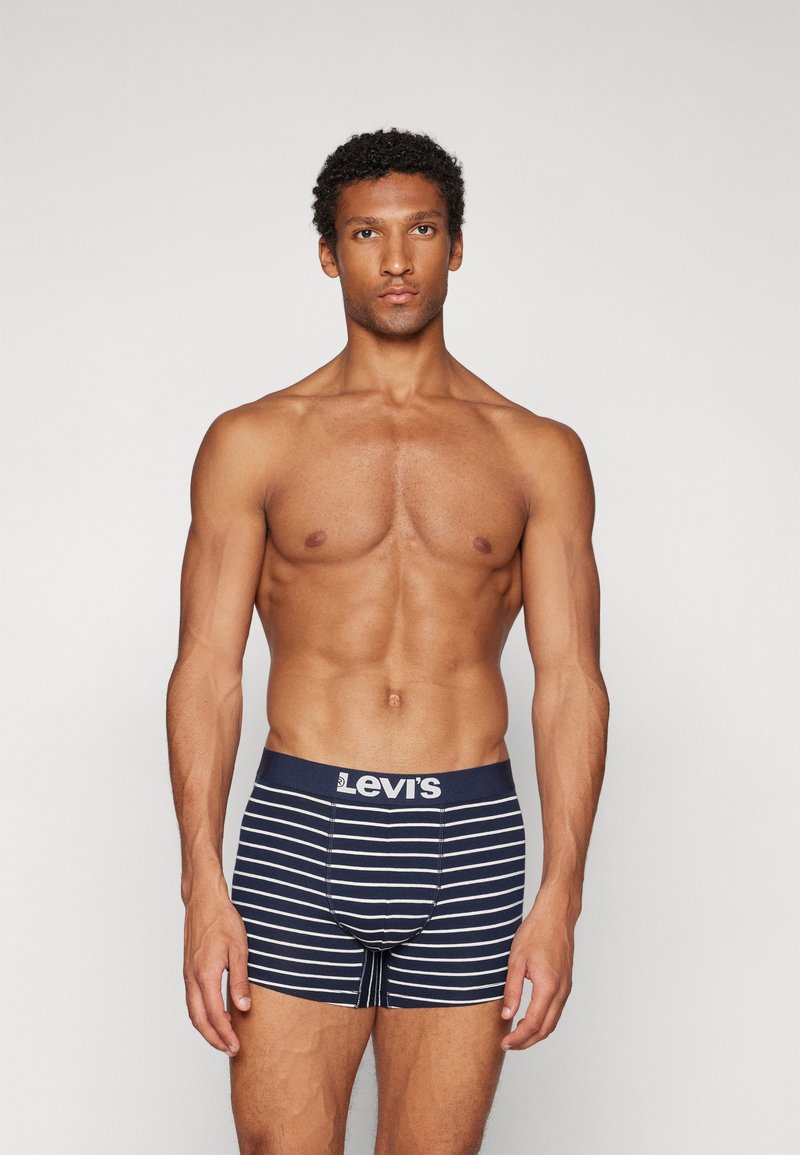 Herrens Levi's marinblå randiga kalsonger med en logoband; bomullsmaterial, figurnära design och horisontella vita ränder.
