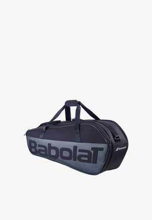 Black and gray Babolat tennis racket bag with dual handles and adjustable shoulder strap, angled on white background.