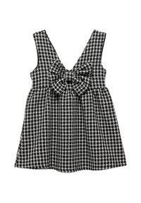 Ärmelloses schwarz-weiß kariertes Kleid mit V-Ausschnitt und einer großen Schleifendetail an der Taille, aus einem strukturierten Stoff gefertigt.