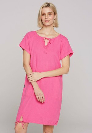 Pink linen dress with short sleeves, a keyhole neckline, and drawstring details. Features side pockets and a loose fit.