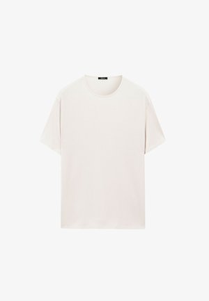 Helles beigefarbenes Baumwoll-T-Shirt mit Rundhalsausschnitt, kurzen Ärmeln und lockerer Passform, mit einer glatten, gleichmäßigen Textur.