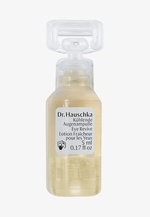 Vial en plastique transparent contenant une lotion pour les yeux jaune clair. L'étiquette présente un texte noir avec les détails du produit. Volume de 5 ml.