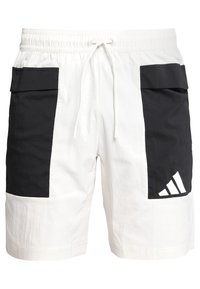 Witte shorts met zwarte zijzakken, elastische tailleband met koord en een wit Adidas-logo op de rechteronderzak.