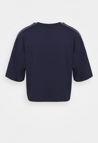 Navy blue short-sleeve t-shirt with a round neckline and accent stitching along the shoulders. Smooth fabric with a relaxed fit.