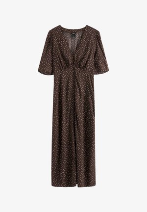 Brun midi-kjole med hvide prikker, V-hals, korte vide ærmer og detaljer med rynket talje.