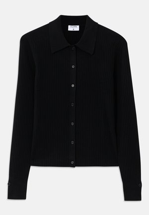Black ribbed cardigan with long sleeves, pointed collar, and front button closure featuring small round buttons. Textured fabric adds depth.