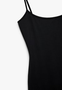 Top nero senza maniche realizzato in tessuto morbido, con spalline sottili regolabili e un design semplice e aderente con scollatura a girocollo.