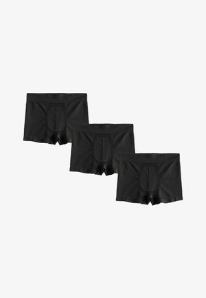 Bolsas cortas negras hechas de tela suave, con una cinturilla elástica y un pouch rectangular. Se exhiben tres pares, todos idénticos.