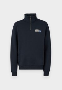 Sudadera de marina con cuello alto, cierre de cremallera y puños acanalados. Presenta el logo "LES DEUX SOCIETY" con un gráfico de baloncesto azul. Textura suave.