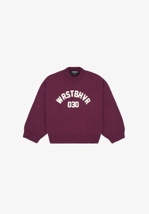 Maroon knitted sweater with ribbed cuffs and hem. Features white text "WRSTBHV" and "030" in a soft, raised texture. Classic crew neck design.