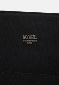 KARL LAGERFELD KIDS CHANGING BAG UNISEX - Taška na detské hygienické potreby  - black