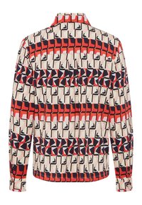 Chemise à manches longues avec motif géométrique en rouge, marine, noir et beige, présentant des carrés et des formes angulaires, vue de dos.