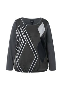 Langemouw top in grijstinten met een geometrisch patroon. Kenmerken zijn een gladde stof, een ronde halslijn en metallic accenten. Tekst leest "MODERN VIEW."