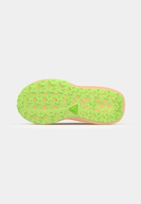 Trail running shoe sole with a textured, vibrant green rubber outsole, featuring triangular lugs for grip, and a light orange midsole.