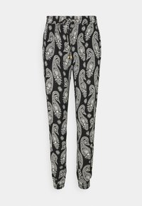 Pantalons noirs avec un motif cachemire blanc, taille élastique avec cordon de serrage et poignets élastiques, fabriqués en tissu doux avec une texture lisse.