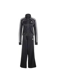 Black athletic tracksuit made of smooth fabric, featuring a zip-up jacket with high collar and three white stripes on sleeves, matching wide-leg pants.
