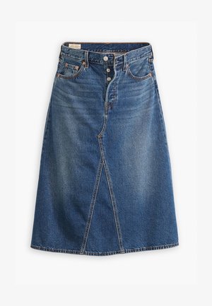 Denim skirt in medium wash blue with a A-line shape, front slit, five pockets, and button closure at the waist.
