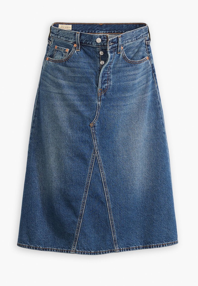 Jupe en denim à bleu délavé moyen avec une forme évasée, fente à l'avant, cinq poches et fermeture à boutons à la taille.