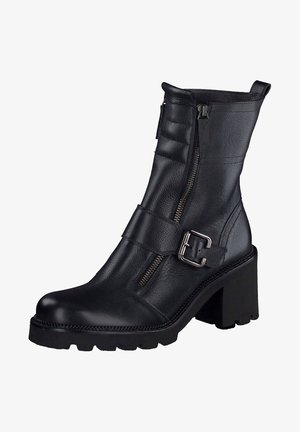 Bottine en cuir noir avec un talon épais, comprenant des fermetures éclair latérales, une bride avec une boucle argentée et une finition texturée.