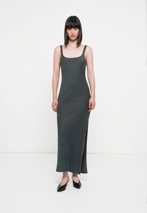 Sleeveless maxi dress in dark grey, featuring a square neckline, side slit, and decorative stitching along the straps and hem.