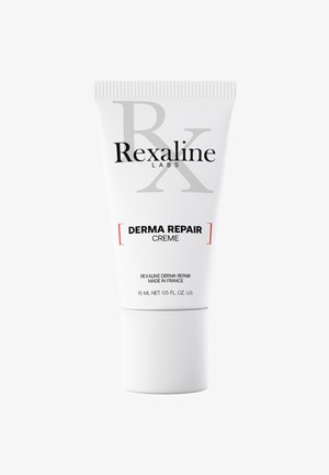 White squeeze tube with a ribbed cap, featuring black and red text that reads "Rexaline Labs Derma Repair Creme." Contains 15 mL.