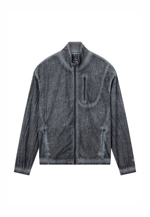 Grijze ritssluitingjas met een gestructureerde afwerking, staande kraag en een borstzak. Voorzien van elastische manchetten en een getailleerd ontwerp.