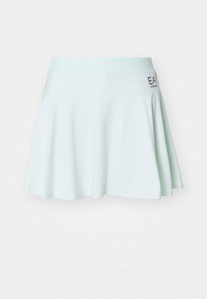 Lys myntegrønn skaterkjole laget av glatt stoff, med en teksturert midjebånd og et lite logodetalj på siden.