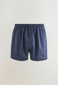 Blaue karierte Boxershorts mit elastischem Bund und Knopfverschluss vorne. Hergestellt aus leichtem Stoff mit glatter Textur.