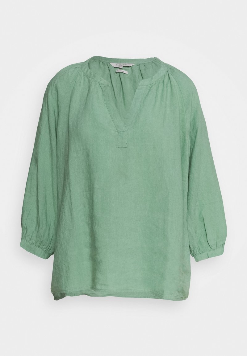 Blouse à manches longues vert menthe avec poignets froncés et encolure en V fendue, en tissu léger, présentée sur fond blanc.