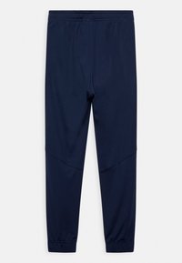 Nike Performance CR7 B NK DF PANT KPZ - Pantalon de survêtement - obsidian/white